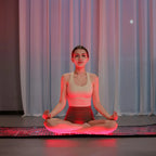 A red light therapy mat from the Wellness at Home collection in use at home