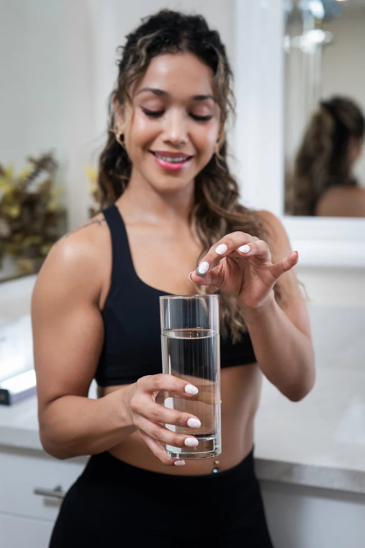 Dropping a Rejuvenation tablet into a glass of water