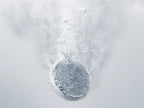 A Relief hydrogen bath tablet fizzing in water